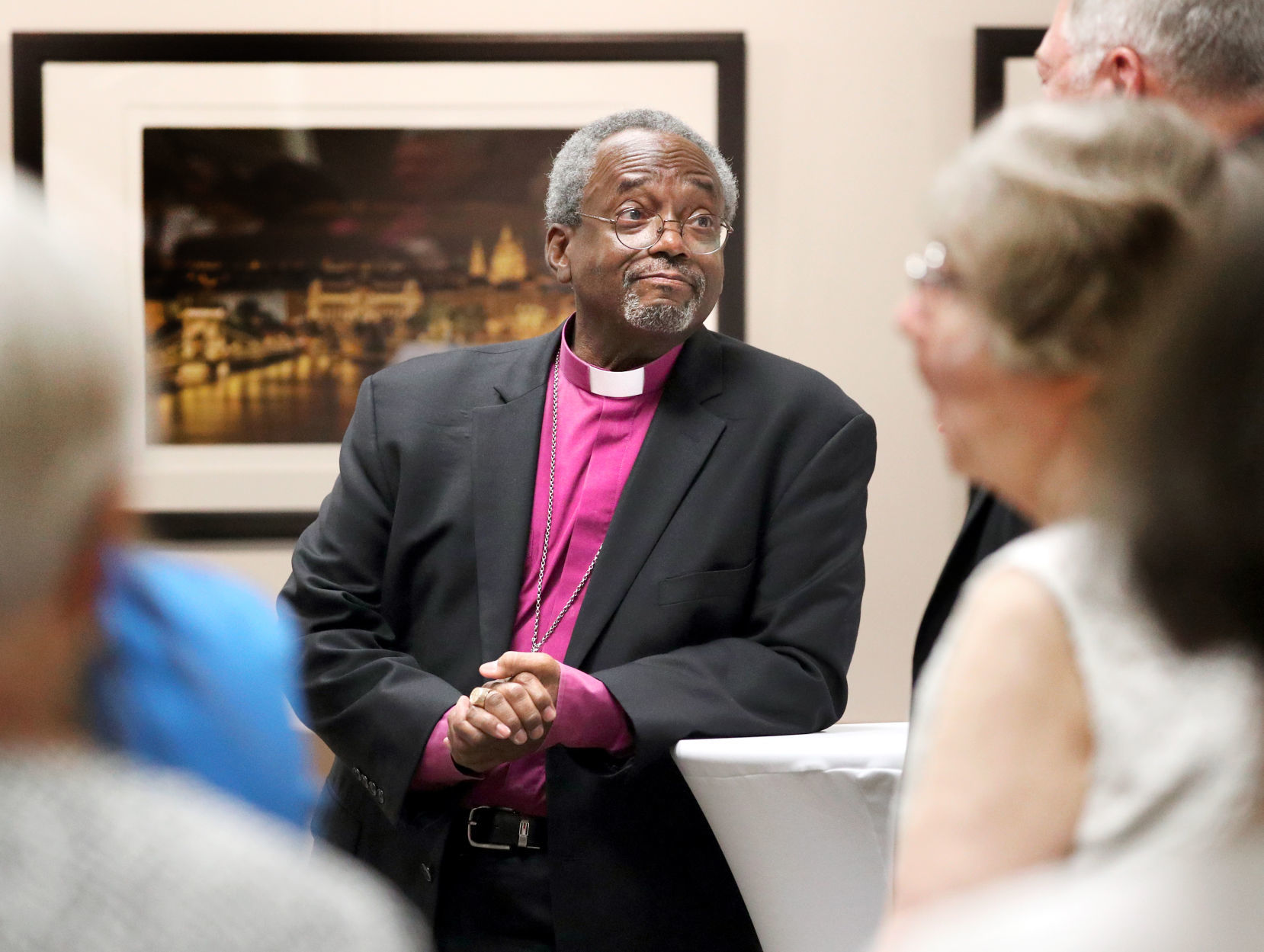Bishop Michael Curry listens to question
